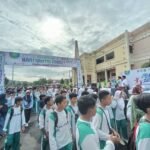 Sebanyak 25 ribu peserta memadati GOR Pandanaran Wujil, Bergas, Kabupaten Semarang, Sabtu (25/10/2025), untuk mengikuti jalan sehat PWNU Jawa Tengah dalam peringatan Hari Santri Nasional 2025. Kegiatan ini digelar guna mempererat silaturahmi, menumbuhkan kebersamaan, dan memeriahkan HSN dengan hadiah menarik serta semangat kebangsaan.