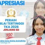 Siswi SD Negeri Salatiga 06, Kiandra Isna Aisha Anindhita, mencatat prestasi gemilang dengan meraih nilai sempurna pada mata pelajaran Matematika dan Bahasa Indonesia dalam Tes Kemampuan Akademik (TKA) 2026. Capaian tersebut mengantarkan Kiandra menjadi peraih nilai rata-rata tertinggi tingkat sekolah dasar di Kota Salatiga, sekaligus menunjukkan kualitas pendidikan dasar yang terus berkembang melalui kerja keras siswa, dukungan keluarga, dan sekolah.